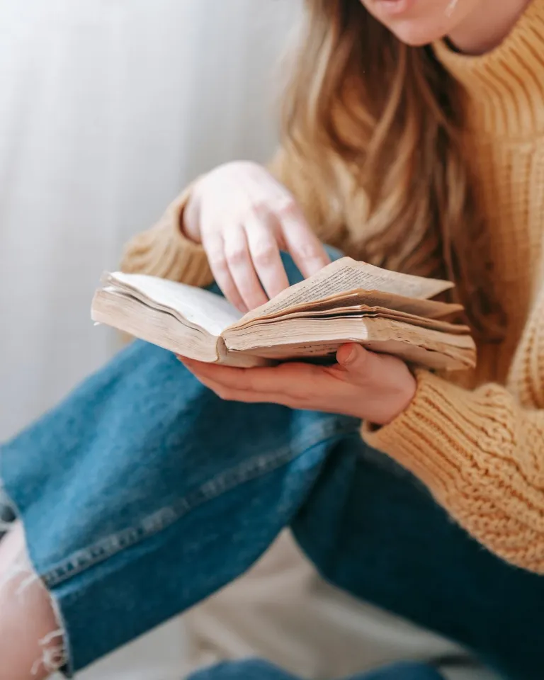 self care tips photo of a woman reading 