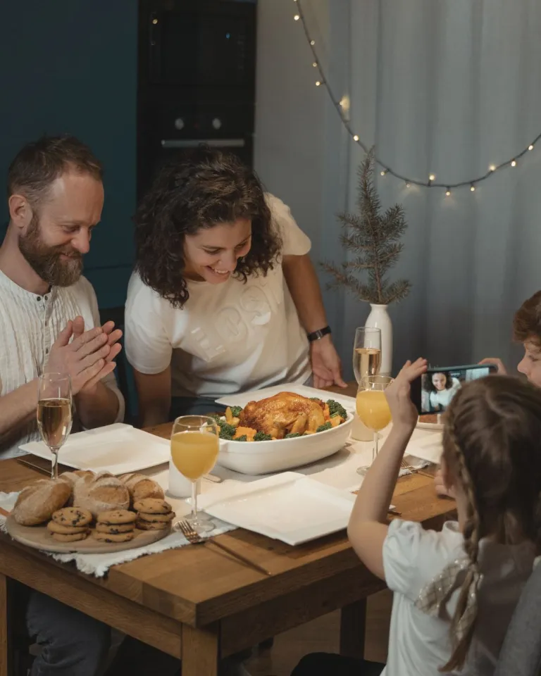 meaningful time photo of a family gathered for a meal